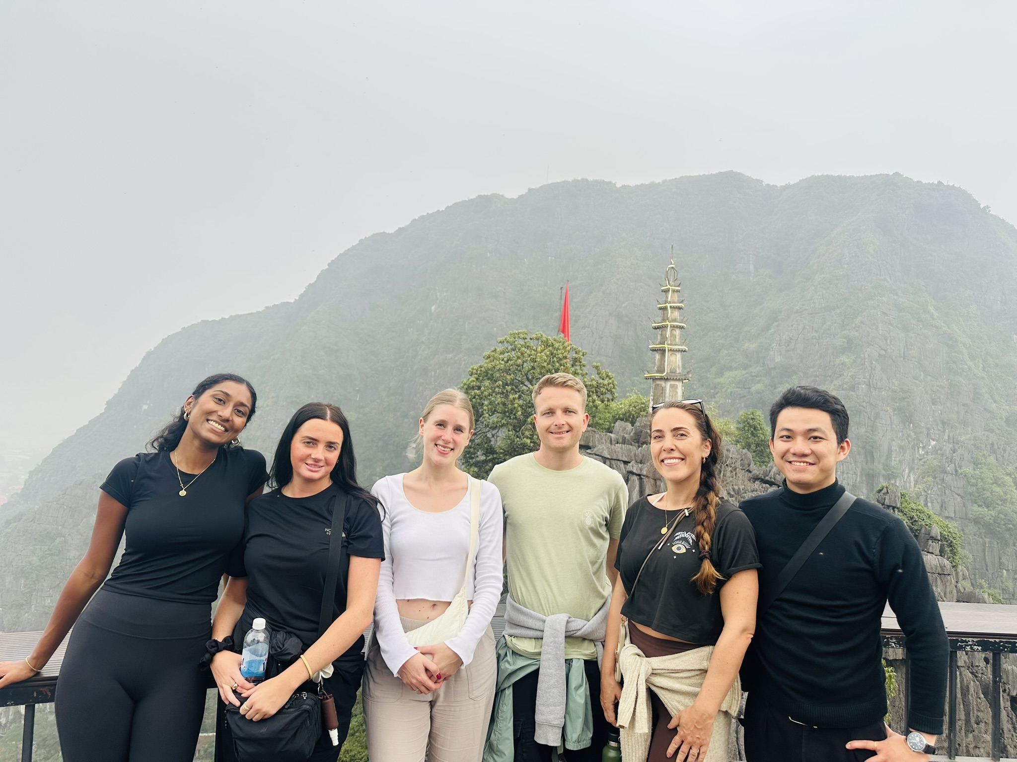 Ancient spiritual temples built into the mountain cliffs of Trang An